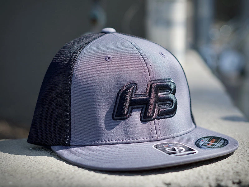 HB Sports Headbanger Sports I8501 Cap America Flexfit Performance Trucker Mesh Back Hat: Graphite / Black Apparel 3 HB Sports Headbanger Sports I8501 Cap America Flexfit Performance Trucker Mesh Back Hat: Graphite / Black Apparel