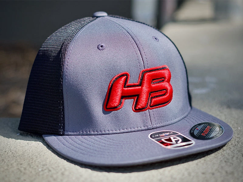 HB Sports Headbanger Sports I8501 Cap America Flexfit Performance Trucker Mesh Back Hat: Graphite / Red 3 HB Sports Headbanger Sports I8501 Cap America Flexfit Performance Trucker Mesh Back Hat: Graphite / Red