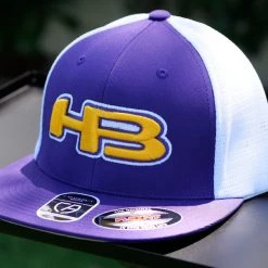 HB Sports Apparel Headbanger Sports Exclusive I8501 Cap America Flexfit Performance Trucker Mesh Back Hat: Purple / Yellow / White