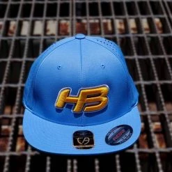 HB Sports Headbanger Sports I8503 Cap America Flexfit Perforated Performance Hat: Powder Blue & Yellow Apparel