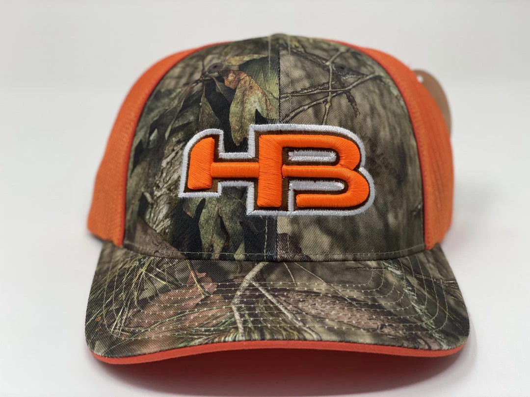 HB Sports Exclusive 694M | Mossy Oak® Trucker Mesh Flexfit: Rifle Season 6 HB Sports Exclusive 694M | Mossy Oak® Trucker Mesh Flexfit: Rifle Season