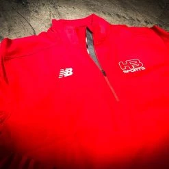 HB Sports New Balance Lightweight Solid Half Zip Pullovers
