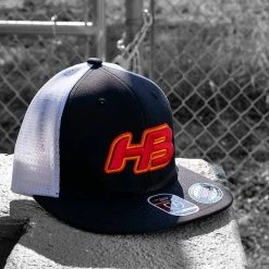 HB Sports Apparel Headbanger Sports I8501 Cap America Flexfit Performance Trucker Mesh Back Hat: Black / White / Sunset